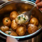 Perfectly cooked instant pot baked potatoes ready to serve