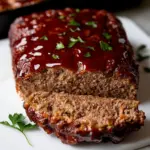 Juicy Keto Meatloaf with glossy glaze served on a plate