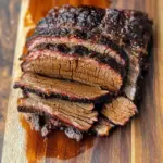 Delicious Crockpot brisket served on a plate with sides