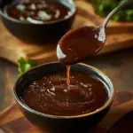 Texas Roadhouse steak sauce bottle with a mouthwatering steak