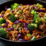 High protein egg roll bowl with fresh vegetables and spices