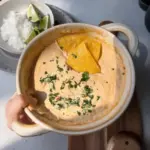 Delicious 3-ingredient cottage cheese queso served in a bowl with tortilla chips.