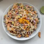 Bold flavor-packed coleslaw served in a bowl with fresh vegetables