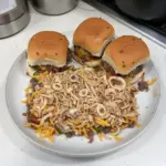 Delicious Cowboy Sliders served on a rustic wooden platter