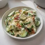 Fresh Cucumber Caesar Salad with crispy romaine, parmesan, and croutons