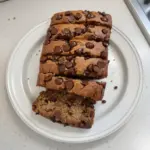 Healthier chocolate chip banana bread slice on a plate