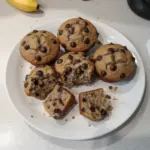 Delicious healthy banana bread protein muffins on a wooden table