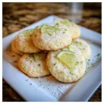 Homemade Key Lime Cookies with zesty lime frosting on a plate