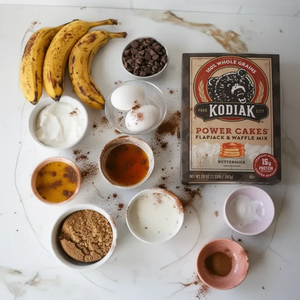 Delicious Kodiak Banana Bread freshly baked and sliced on a wooden table