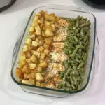 One-Pan Baked Chicken with Potatoes and Green Beans on a serving plate
