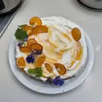 Winter Citrus Olive Oil Cake topped with creamy citrus sauce