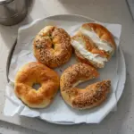 Delicious Air Fryer Protein Bagels topped with seeds and herbs