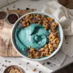 Cookie Monster Smoothie Bowl topped with cookie crumbs and blue toppings