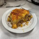 Delicious Cornbread Cowboy Casserole served in a rustic dish
