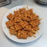 Delicious Frito Bars made with Fritos, toppings, and seasonings.