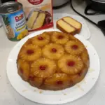 Grandma's delicious Pineapple Upside Down Cake served on a vintage plate