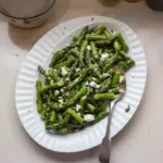 Colorful Greek Asparagus Salad with feta cheese, olives, and fresh vegetables