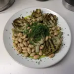 Grilled Artichoke Salad with butter beans and gremolata dressing