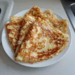 Fluffy high-protein cottage cheese crepes filled with delicious toppings.