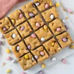 Delicious Mini Egg Cookie Bars decorated with chocolate eggs