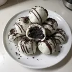 Delicious homemade Oreo Cake Balls drizzled with chocolate