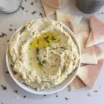 Delicious Parmesan dip made with white beans and artichokes