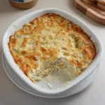 Creamy and delicious Paula Deen's Artichoke Dip served in a bowl