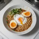 Delicious Ramen Eggs (Ajitama) ready to serve in a bowl of ramen.