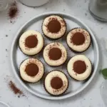 Delicious tiramisu cookie cups filled with coffee-flavored cream and cocoa