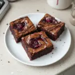 Decadent raspberry swirl brownies with rich chocolate and fresh raspberries