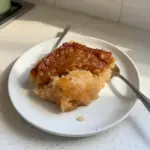 Delicious Biko rice cake topped with coconut milk and sugar.