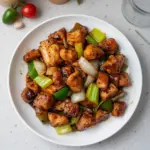 Delicious black pepper chicken dish with vibrant vegetables and spices