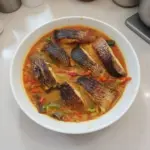 Delicious Curry Fish served with fragrant spices and herbs