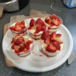 Easy no-bake strawberry cheesecake cups with fresh strawberries