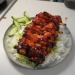 Grilled Korean BBQ Chicken Skewers garnished and ready to serve