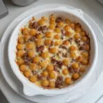 Savory ground venison tater tot casserole baked to perfection