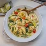 Delicious Thai Fish Curry cooked with coconut milk and spices served in a bowl.